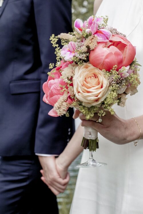 Hochzeitsfotograf Osnabrück Brautstrauss in pink und orange